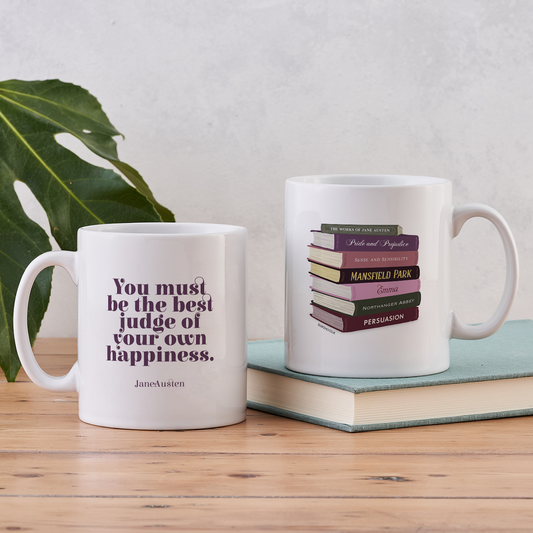 Two-sided Jane Austen mug showing a book stack illustration and the quote “You must be the best judge of your own happiness”