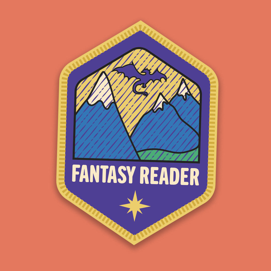 “Fantasy Reader” sticker designed like a stitched merit badge, featuring a mountain range illustration on a rich purple background.