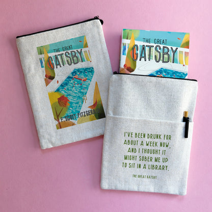 A book sleeve with an illustrated book design and quote from The Great Gatsby.