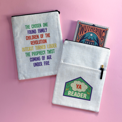 A YA Reader book sleeve with merit patch design on one side and rainbow YA tropes on the other.