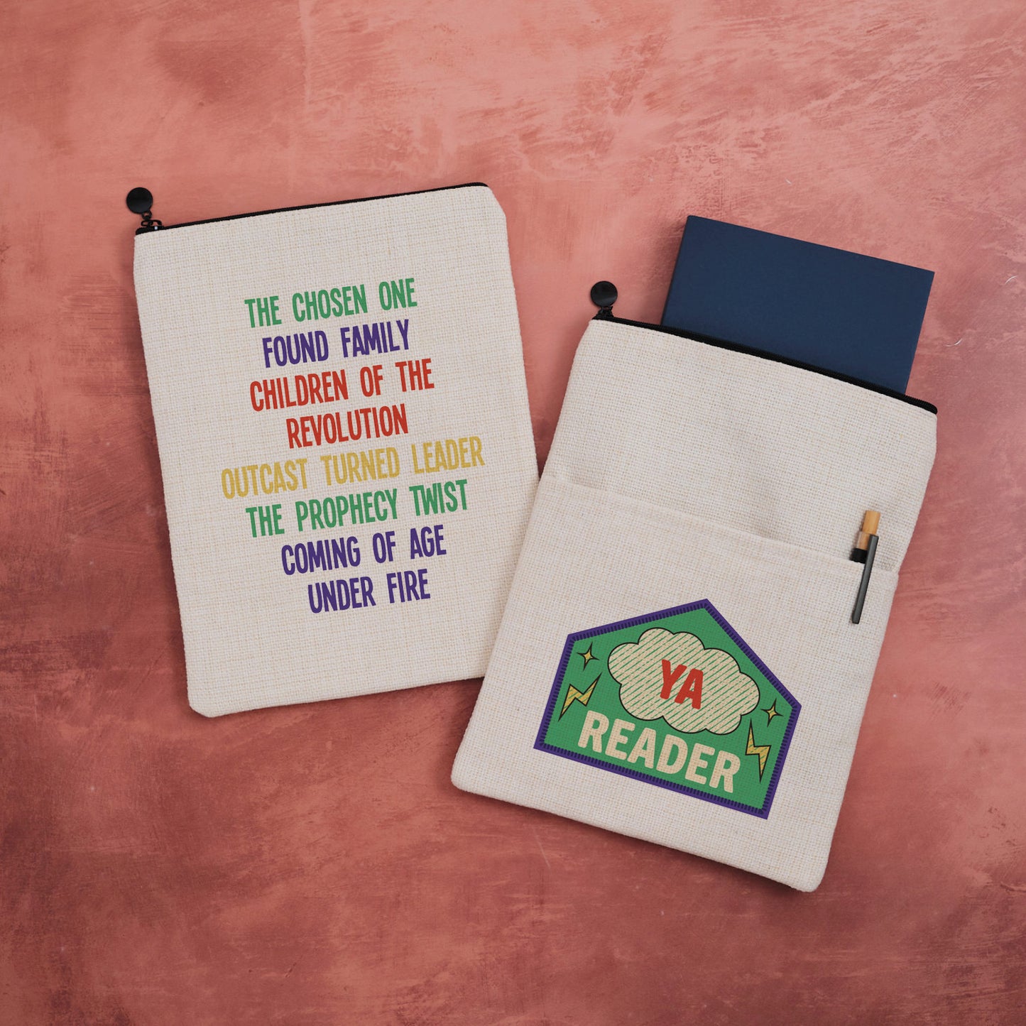 A YA Reader book sleeve with merit patch design on one side and rainbow YA tropes on the other.