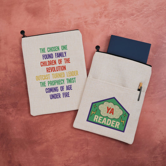 A YA Reader book sleeve with merit patch design on one side and rainbow YA tropes on the other.