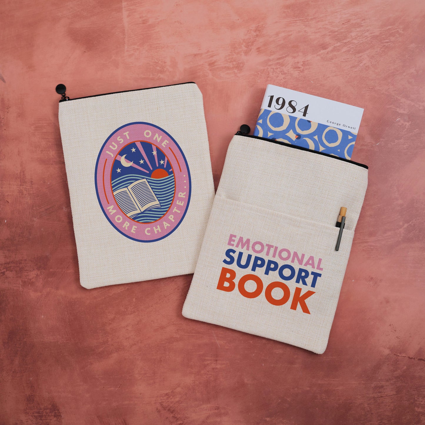 A double sided book sleeve with Just one more chapter on one side and Emotional Support Book on the other.