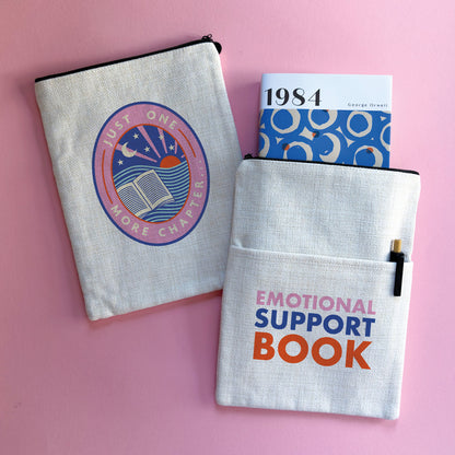 A double sided book sleeve with Just one more chapter on one side and Emotional Support Book on the other.