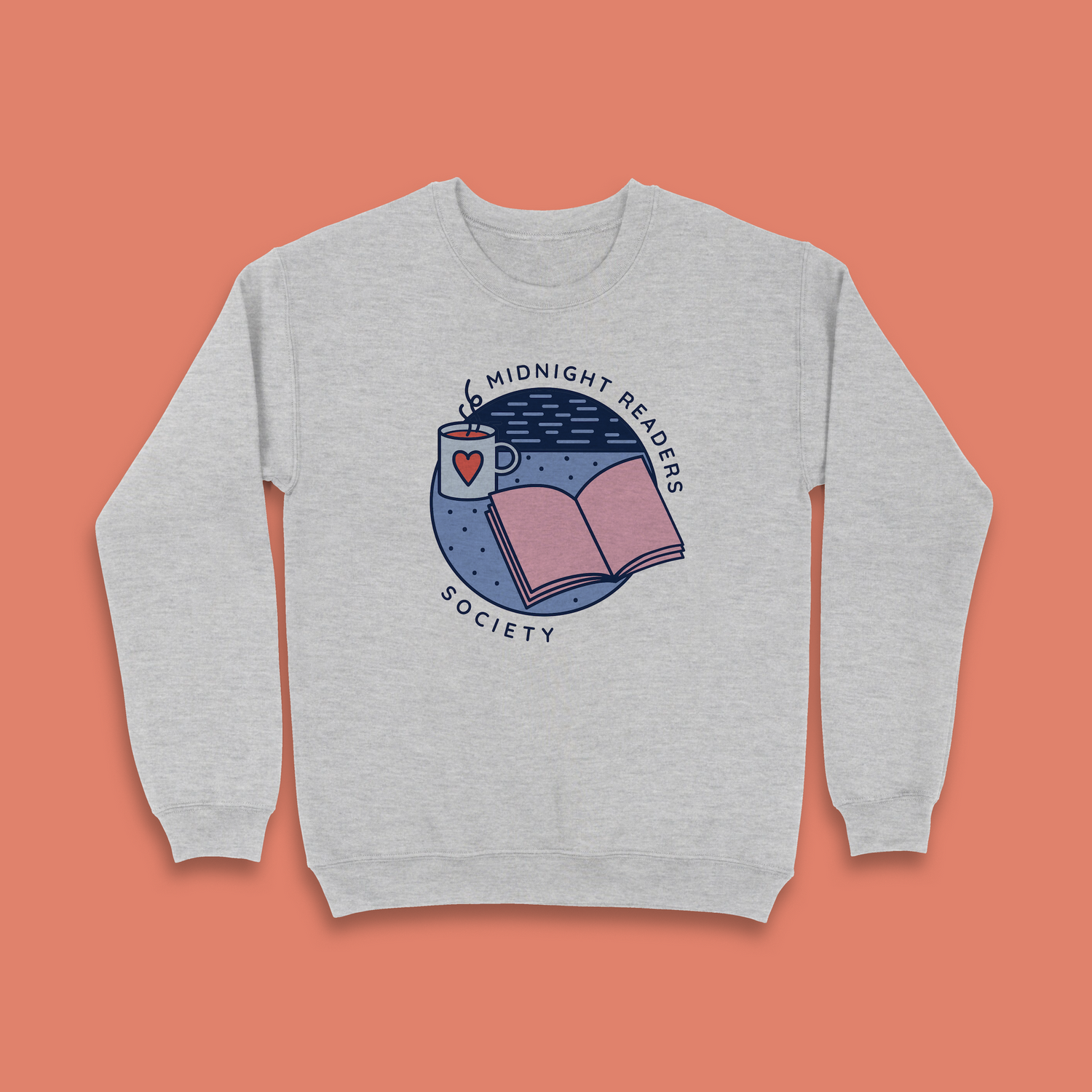 Grey sweatshirt with “Midnight Readers Society” design featuring open book and mug illustration.
