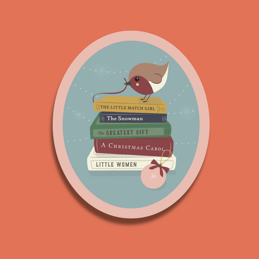 Christmas sticker featuring a robin on top of a stack of books and a bauble